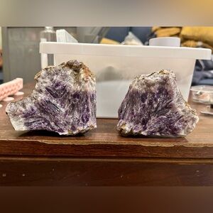 Natural amethyst carved into bookend hearts.